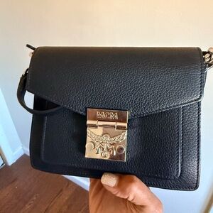 MCM Black Crossbody Bag with Gold Accents